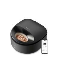Petlibro black automatic wet pet food feeder with visible food compartment and smartphone app control display