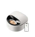 Petlibro smart automatic wet pet feeder in white with stainless steel bowl and mobile app control displayed on smartphone