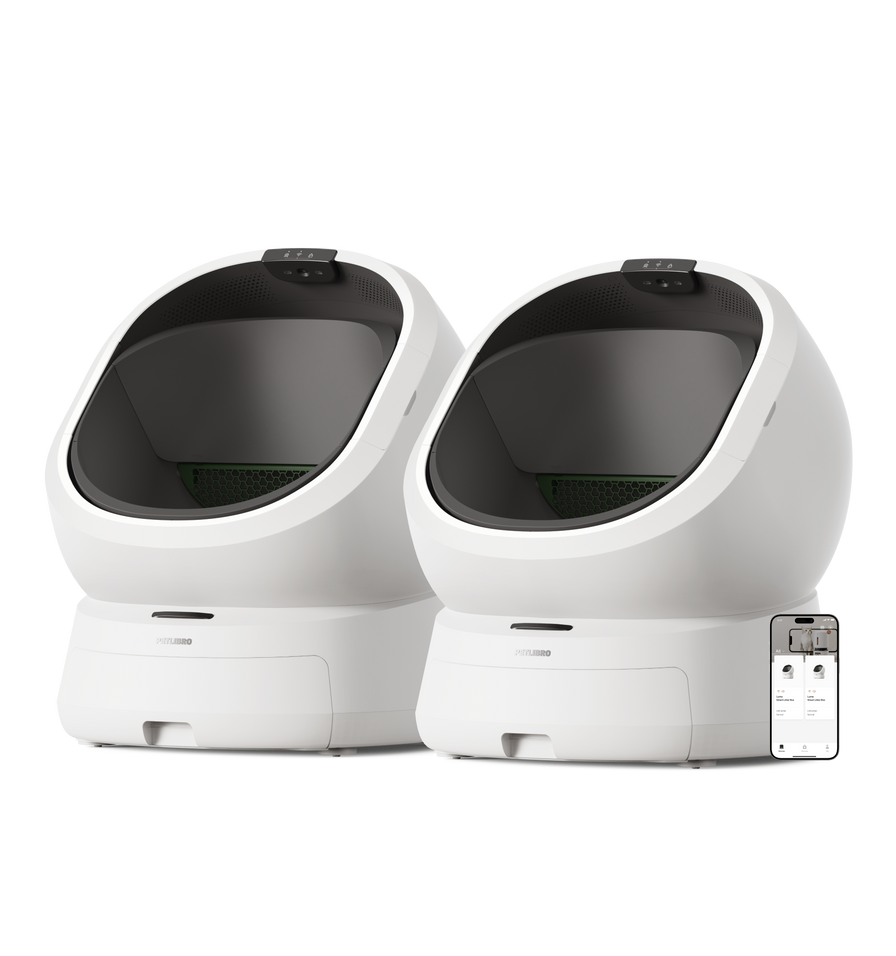 Petlibro automatic self-cleaning cat litter boxes in white with black interiors and smart app control shown on smartphone
