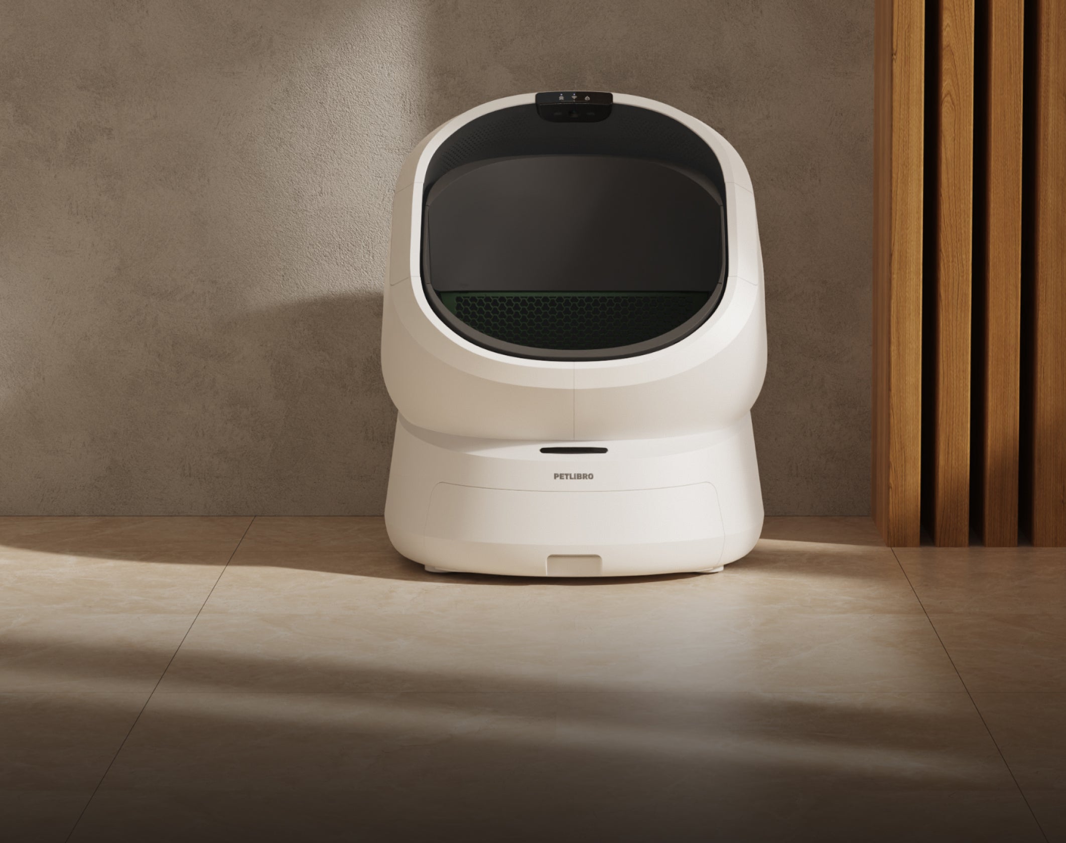 Petlibro automatic self-cleaning cat litter box in white with black entry door, placed on tiled floor indoors