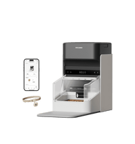 Petlibro smart automatic pet feeder in gray and white with transparent food compartment, paired with a mobile app and pet collar for feeding control