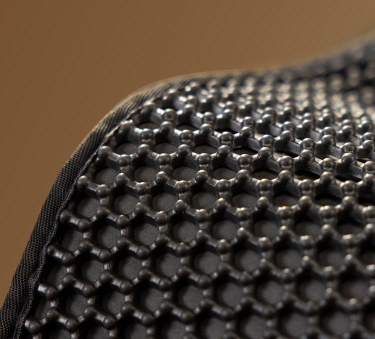 Petlibro close-up of black honeycomb textured non-slip pet mat corner with fabric edge trim
