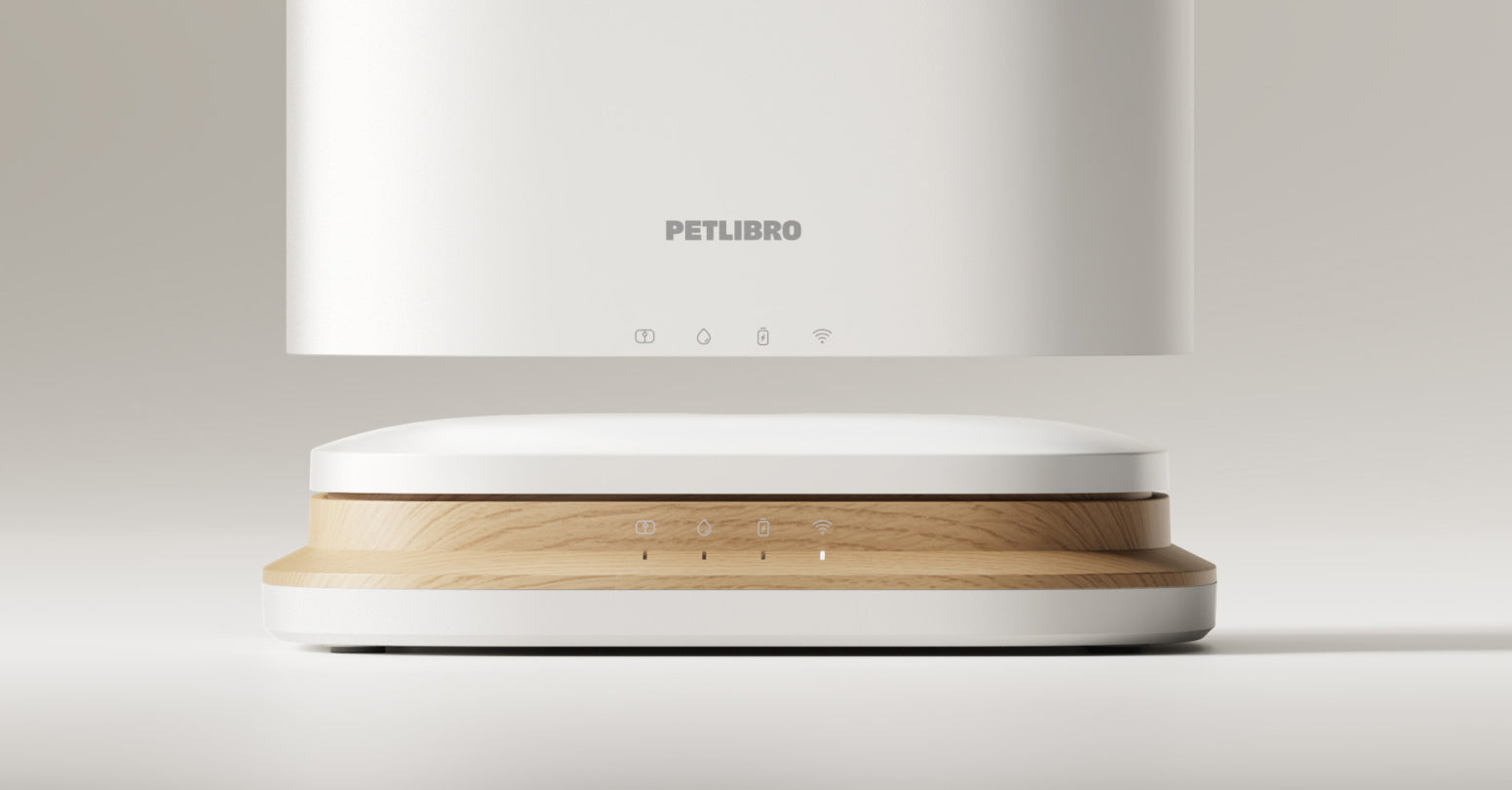Petlibro PETLIBRO pet litter box, white with wood-grain base, sleek low-profile design with LED status icons on front